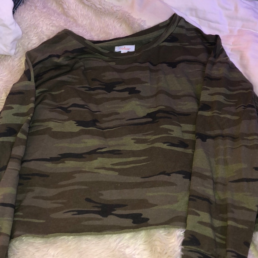 a camouflage sweatshirt